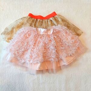 Tutu's 2 each girls one golden one pink size 2t